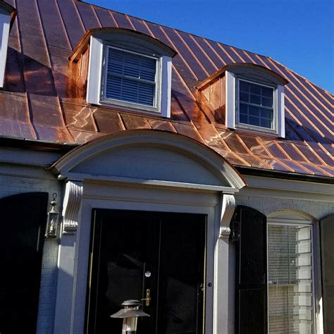 copper metallic metal roof on brick house|brick house with black shingles.